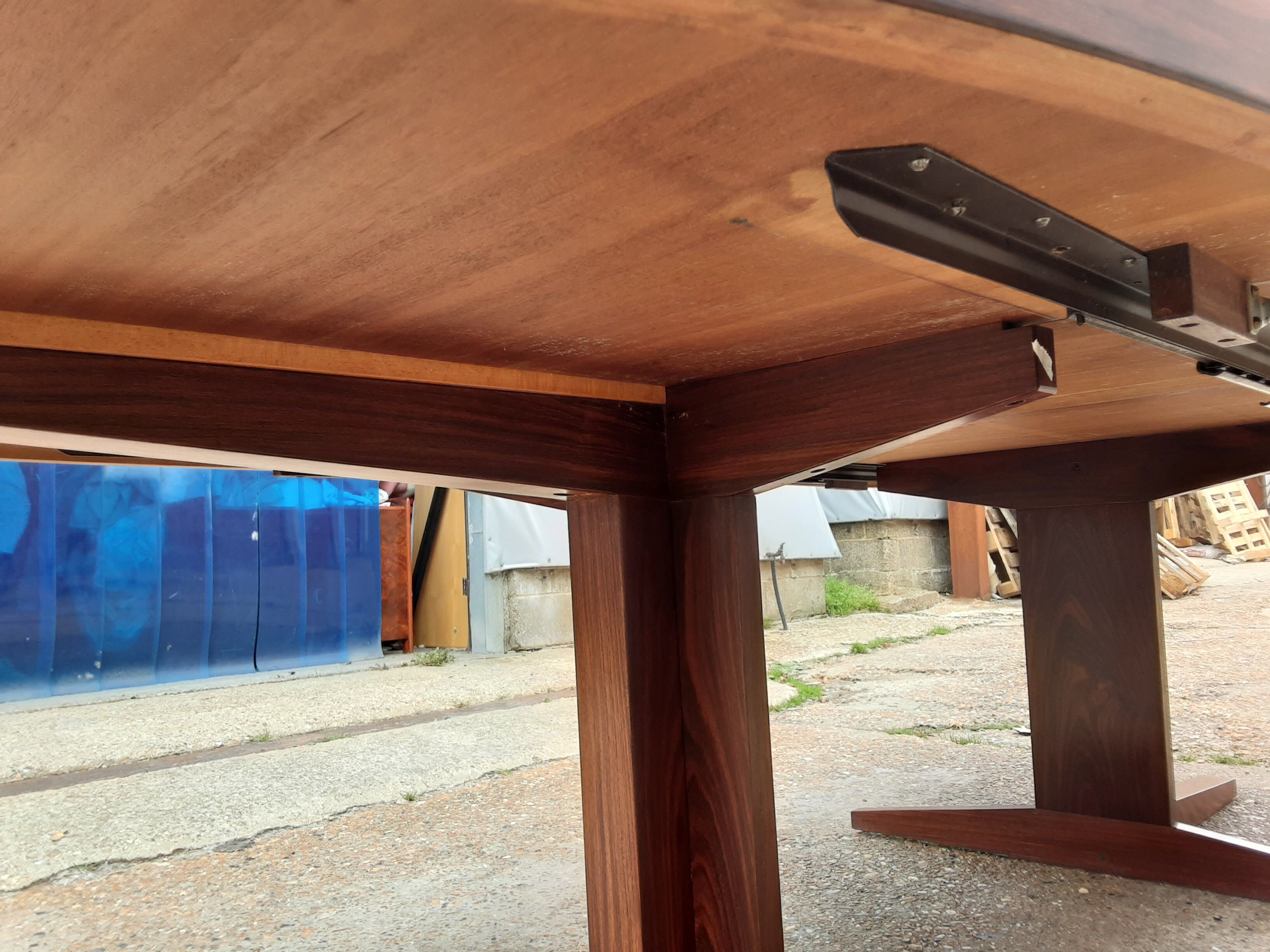 Mid century rosewood extendable dining table by John Mortensen