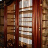 Large Empire library in solid mahogany, late nineteenth century