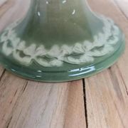 Antique compote stand Lunéville St Clément with green clover decoration.