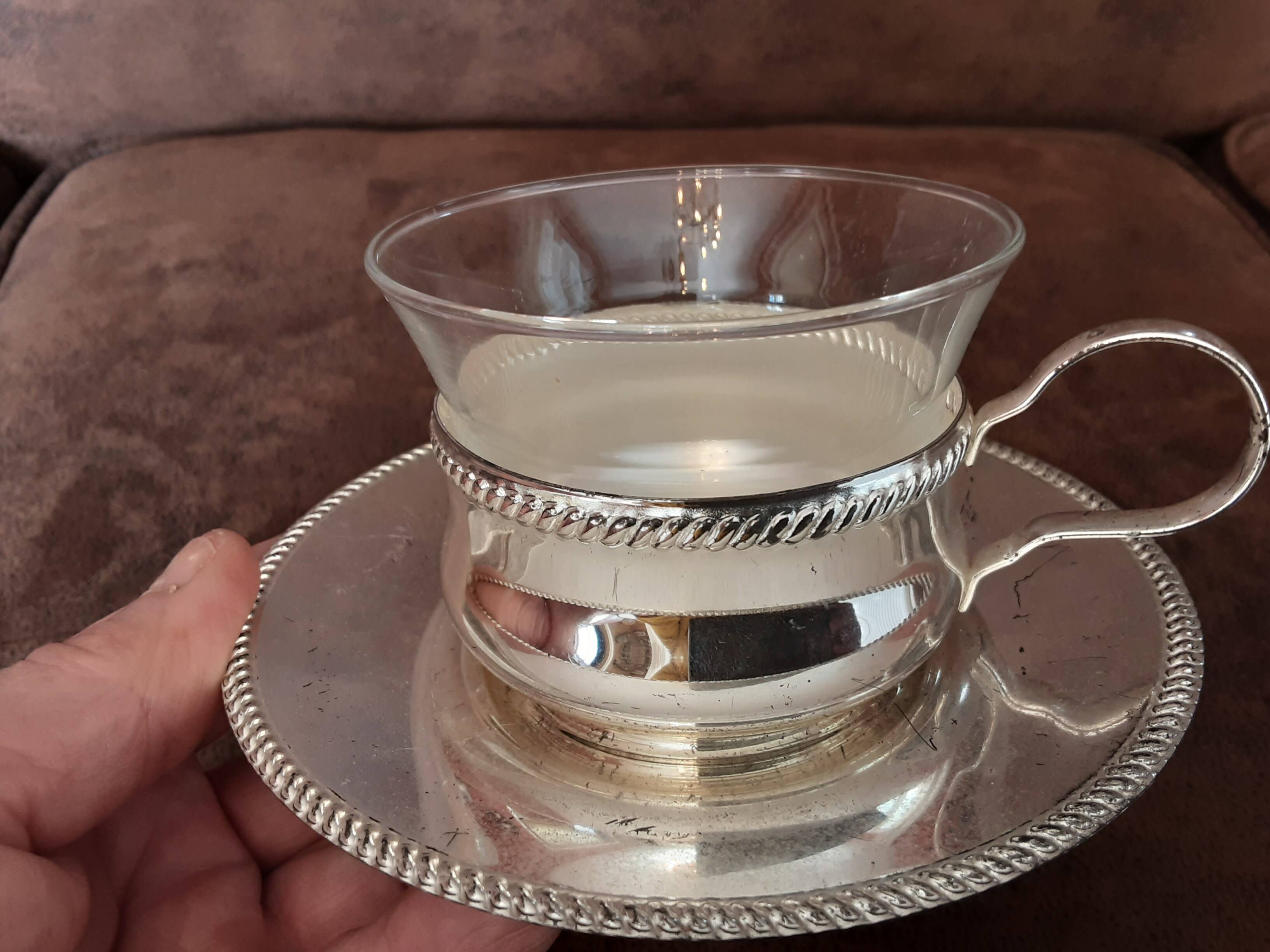 Set of 2 metal cups and saucers