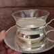 Set of 2 metal cups and saucers