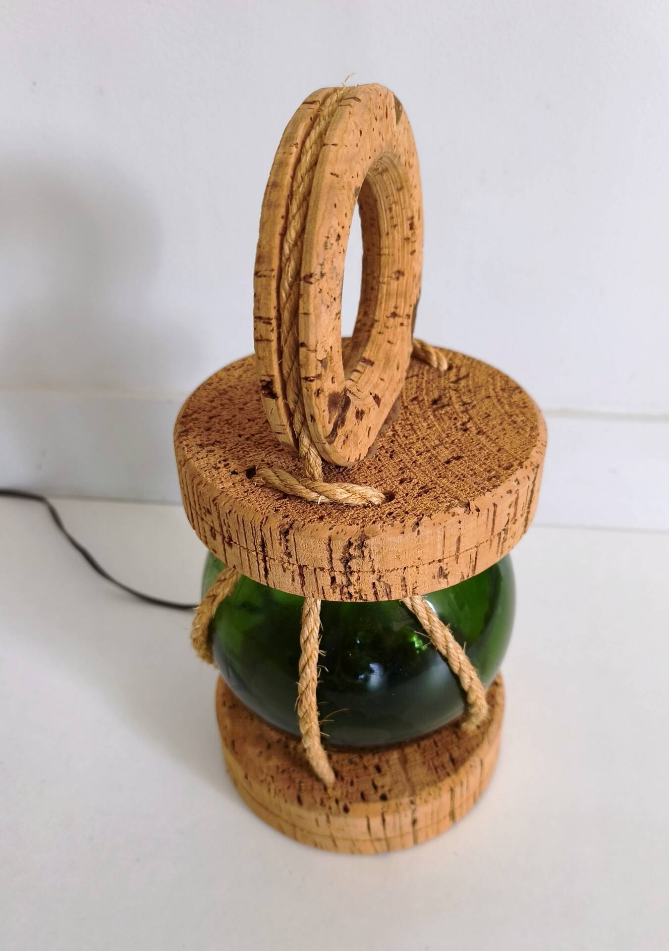 Vintage floating marine lamp made of cork and glass.