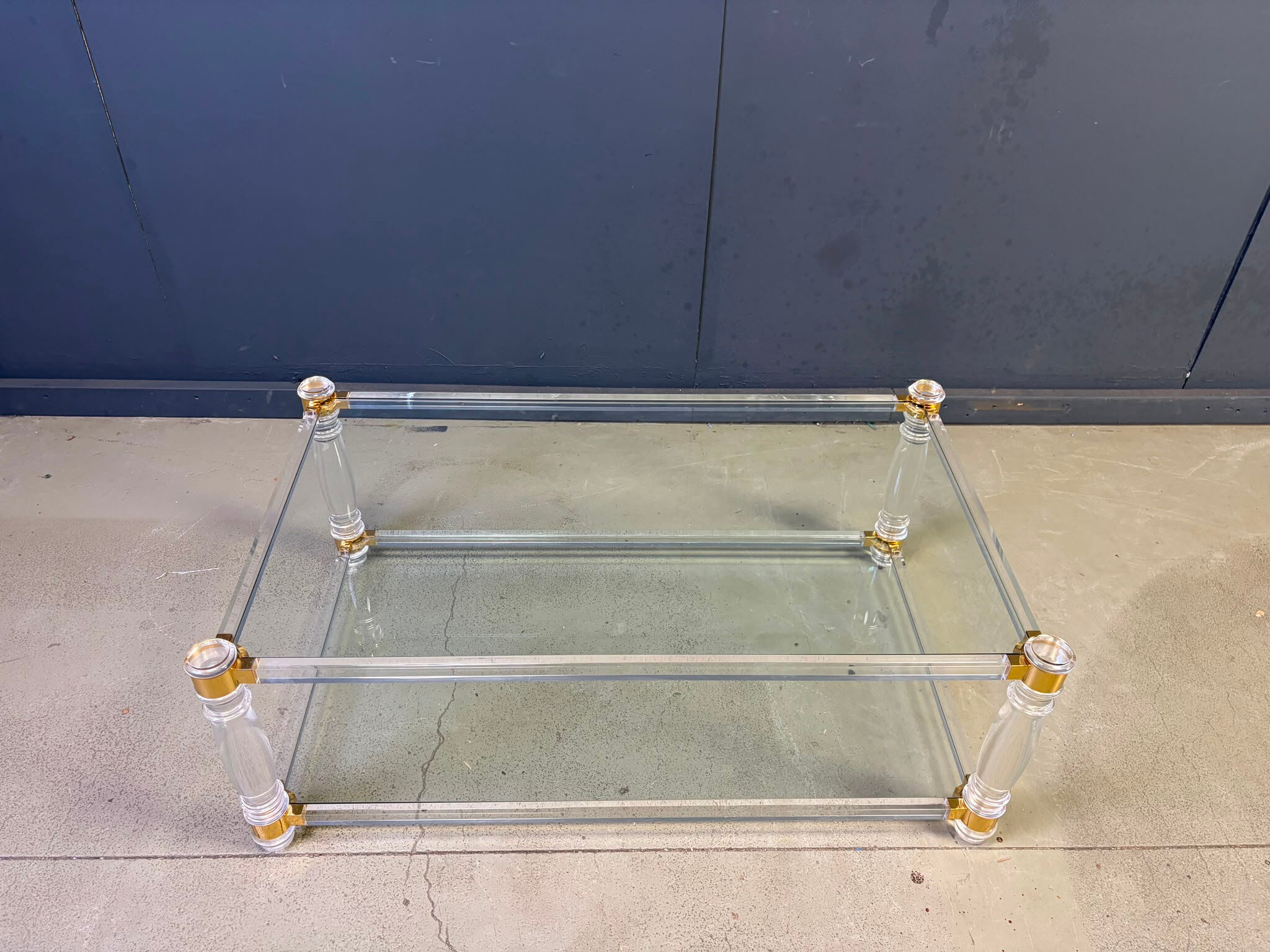 Vintage lucite and brass coffee table, 1970s