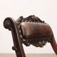 Antique neo-Renaissance chair in wood and leather, 20th century