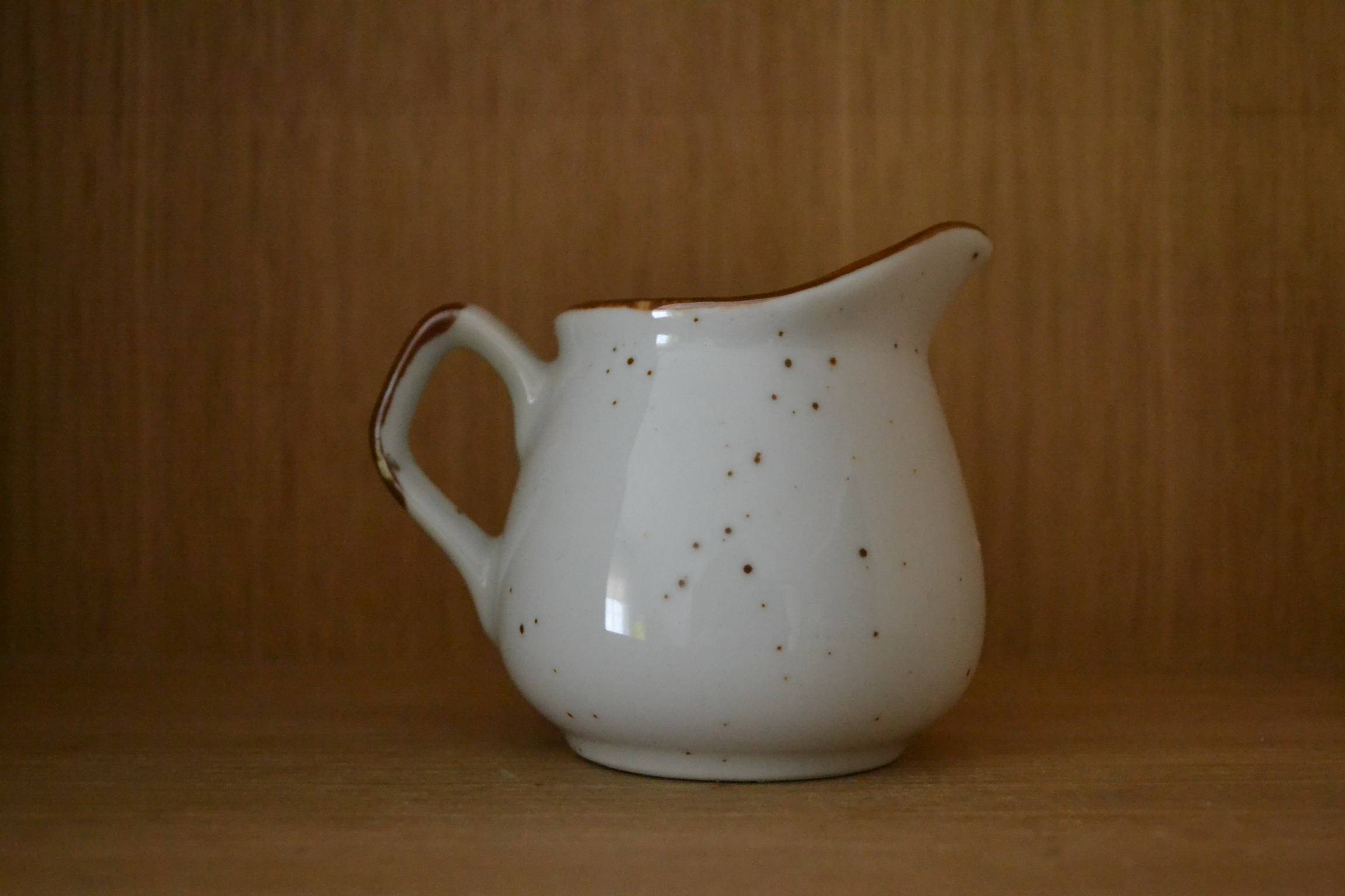 Stoneware milk jug with Japanese motif
