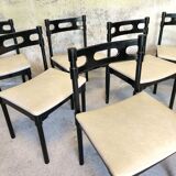 Set of six black lacquered wooden chairs.