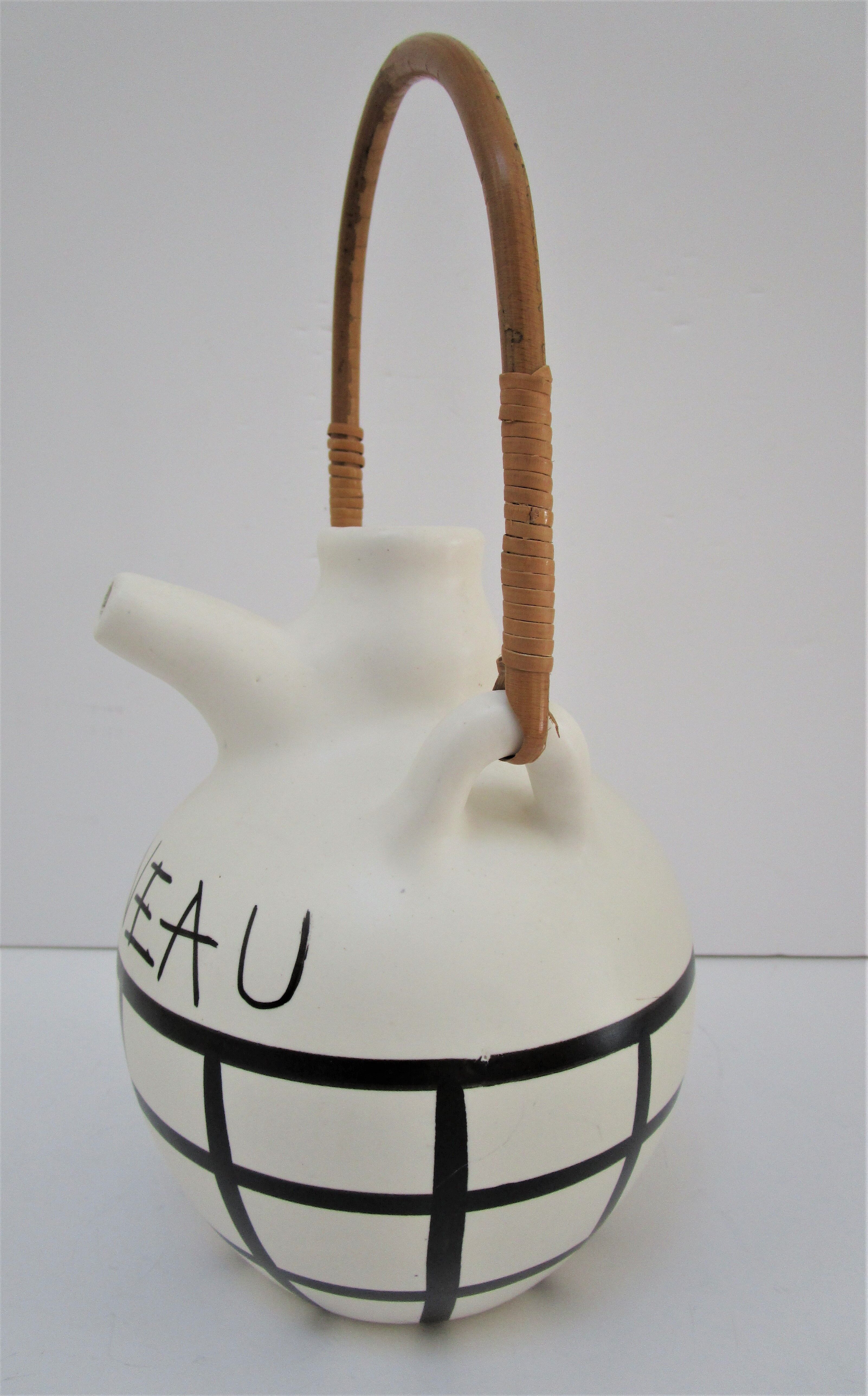 pineau bottle and ceramic cup by Lili Voltz 60s