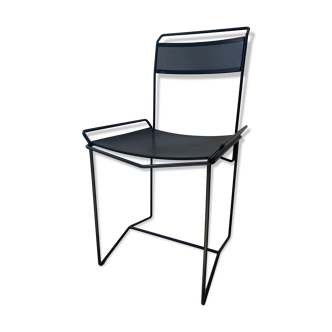 Black perforated steel chair