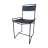 Black perforated steel chair