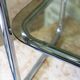 Chrome metal and smoked glass side table.