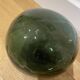 Floating fishing ball in glass