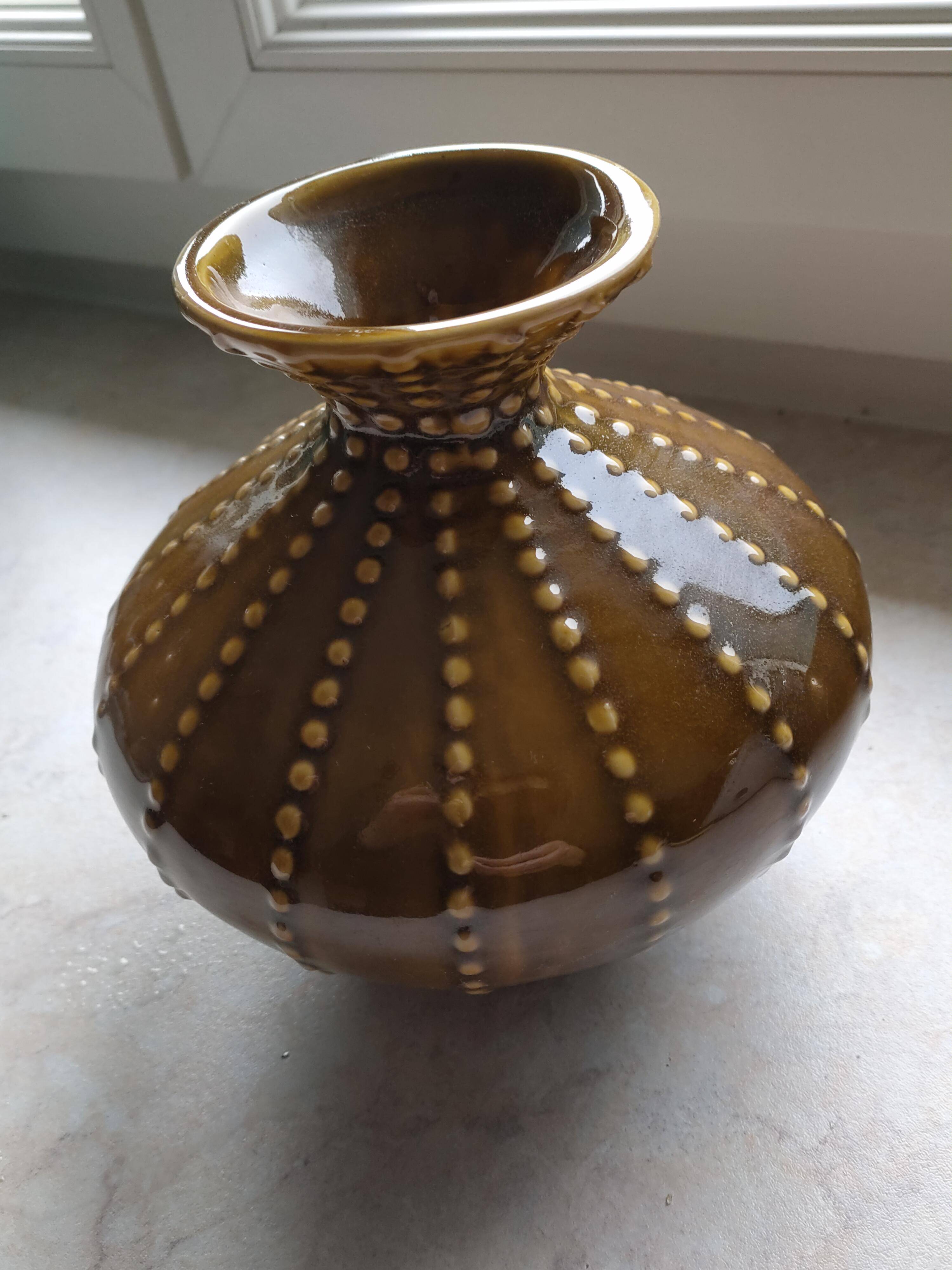Pear-shaped ceramic vase.