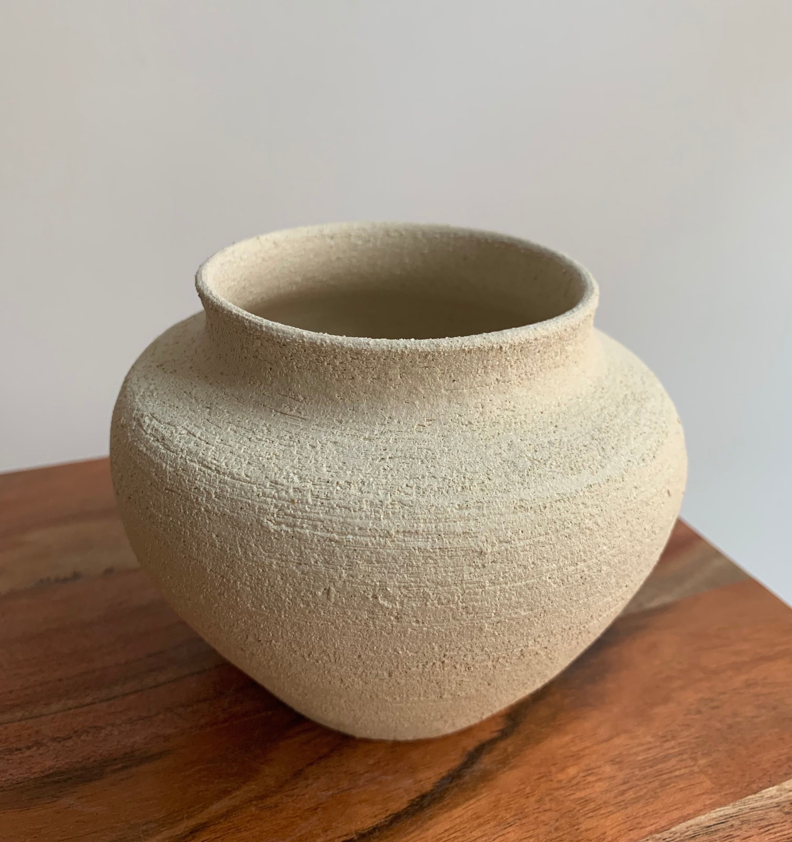 Small white sandstone vase