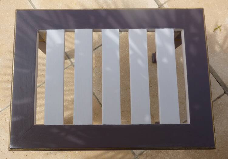 Coffee table or side table in style with its brass strips totalem.
