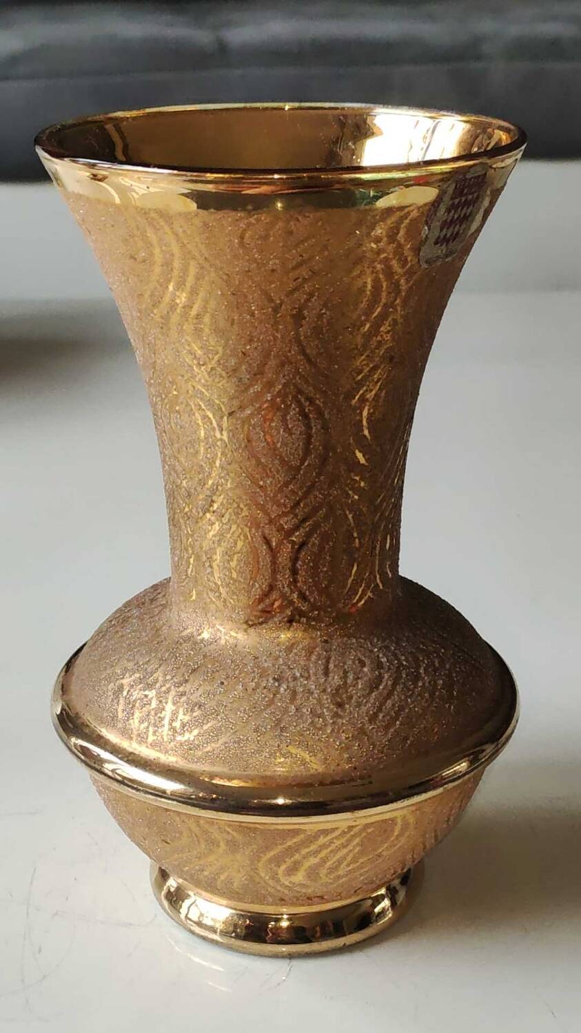 Ball vase stamped Verrerie de Monaco/Monte Carlo. In gold granite glass