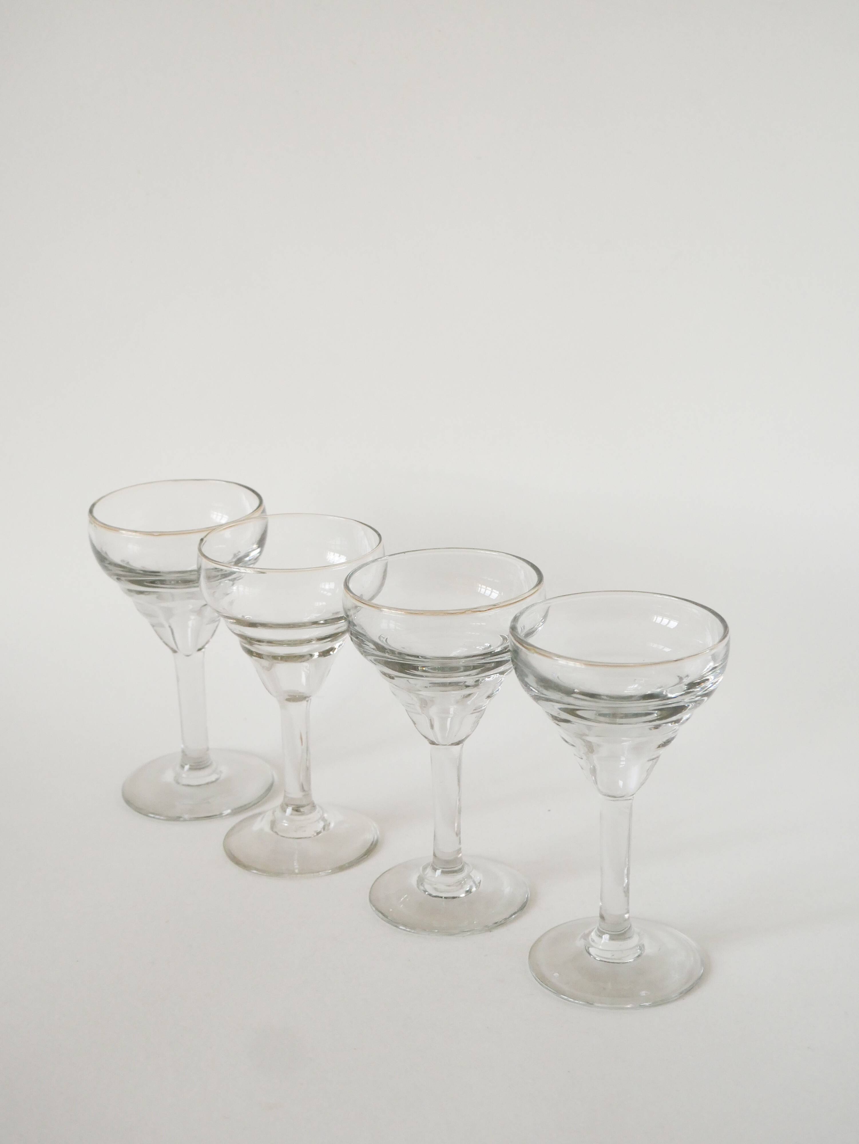 Set of 4 moulded glass wine glasses, 1920