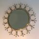 Sun mirror in brass and brushed steel