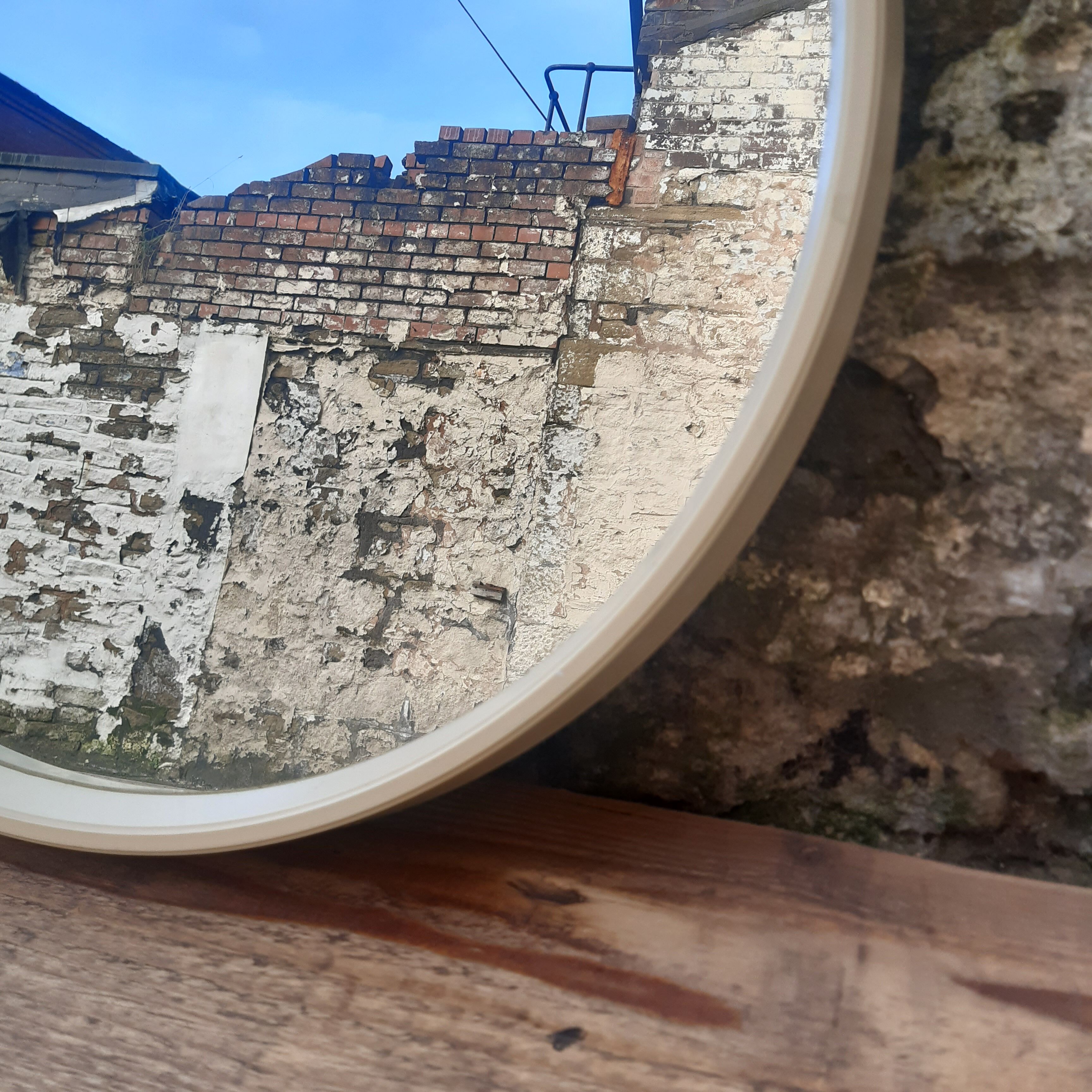 Mid century circular white mirror