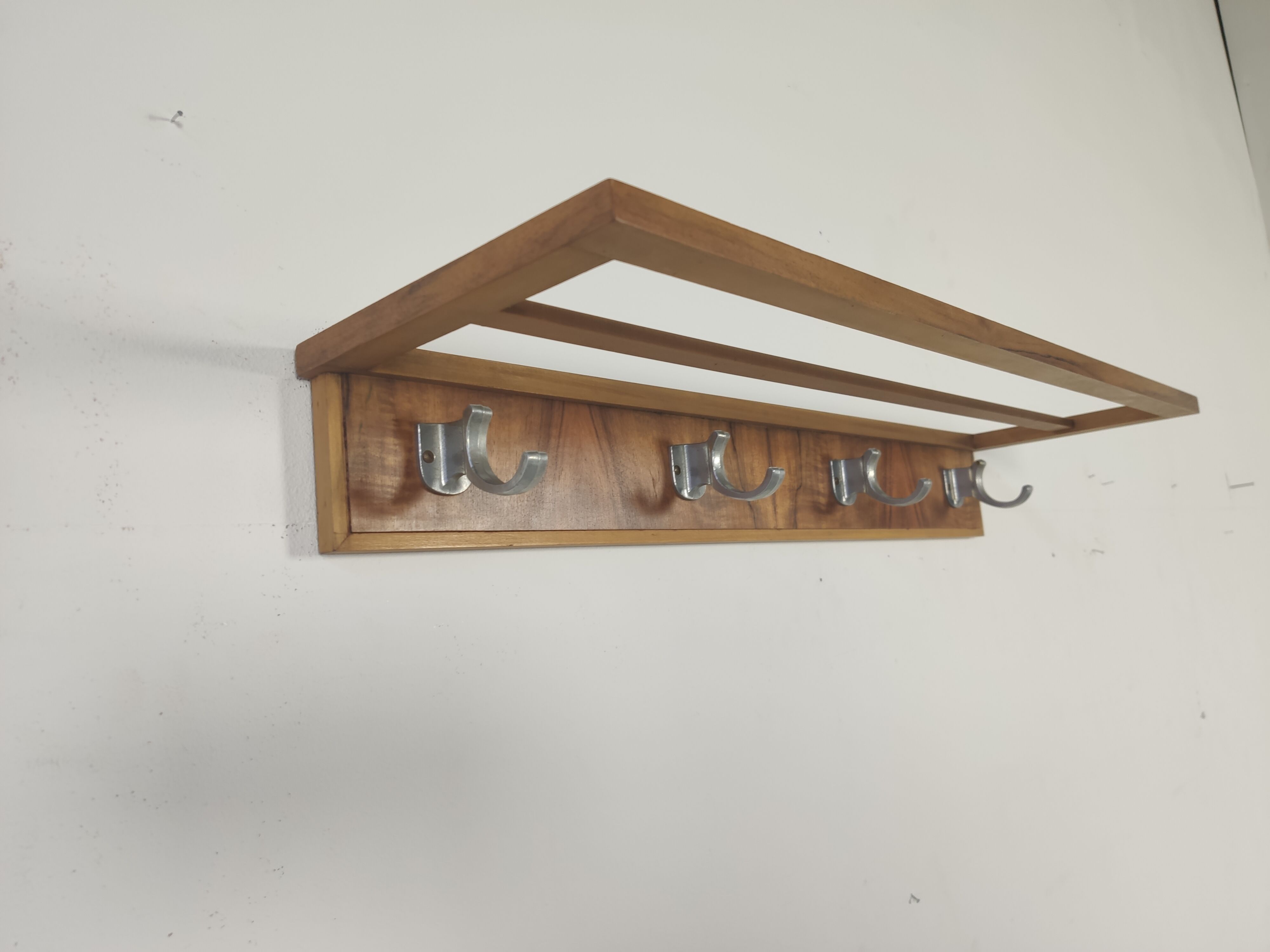 Walnut and metal wall coat rack, 1950s