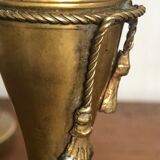 Pair of brass candlesticks with tassels