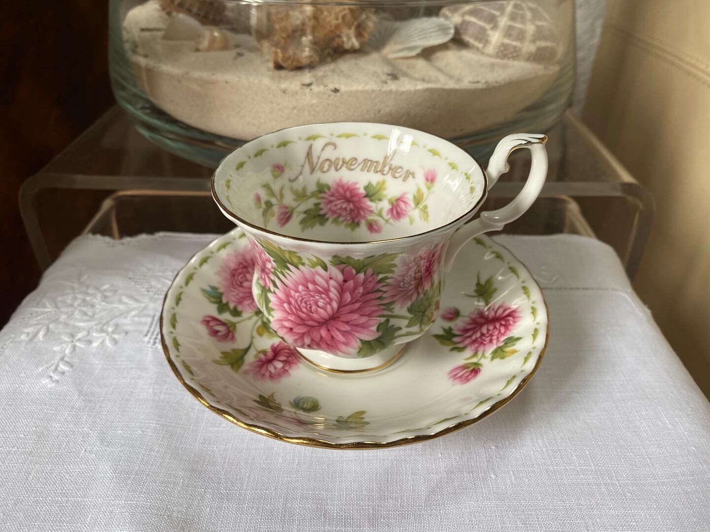 Porcelain cup and sub-cup "November" stamped "Royal Albert"
