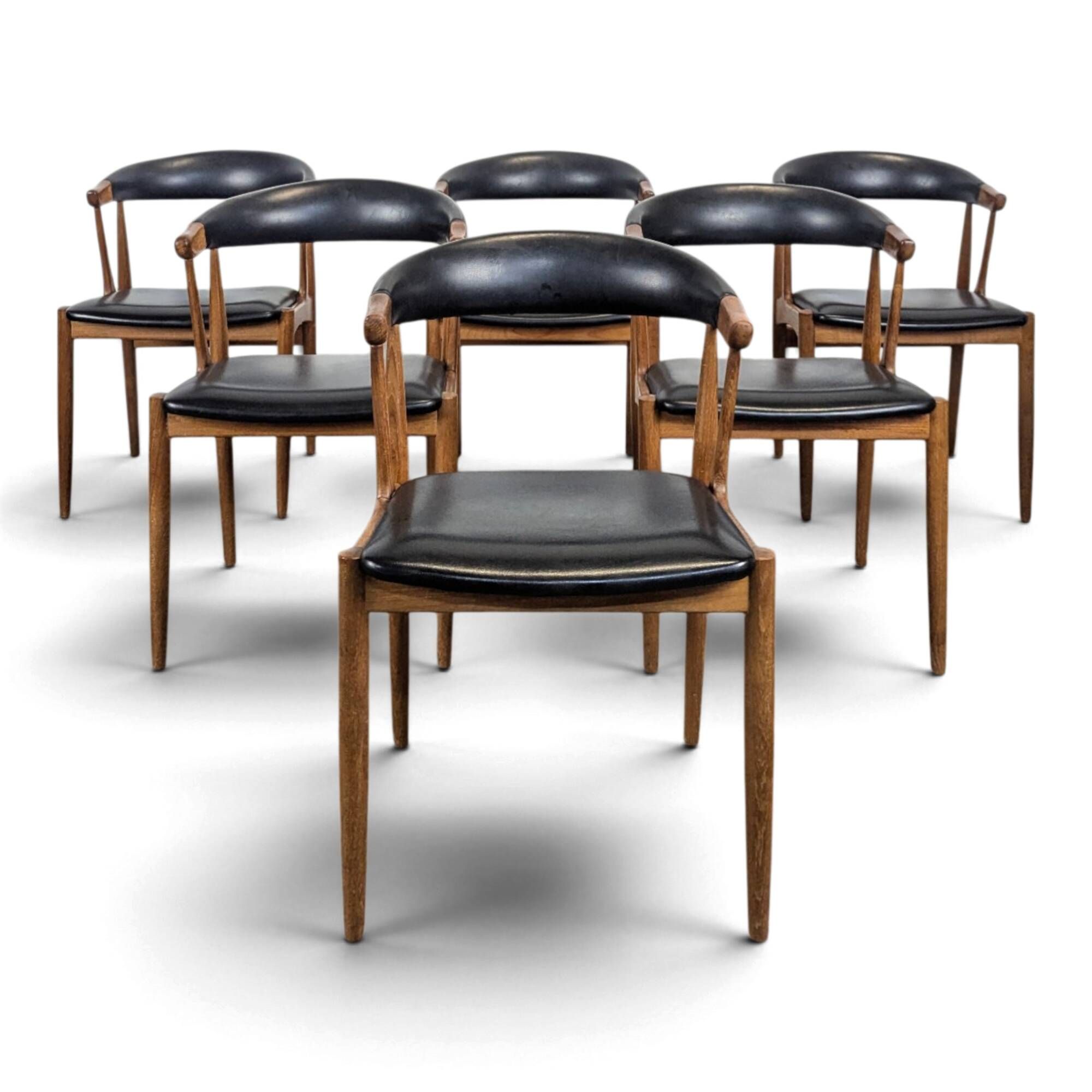 Set of 6 BA113 chairs by Johannes Andersen for Brdr. Andersens Møbelfabrik in teak and black skai.