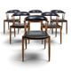 Set of 6 BA113 chairs by Johannes Andersen for Brdr. Andersens Møbelfabrik in teak and black skai.