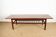Rosewood and metal tube coffee table, two levels, Denmark 1960.