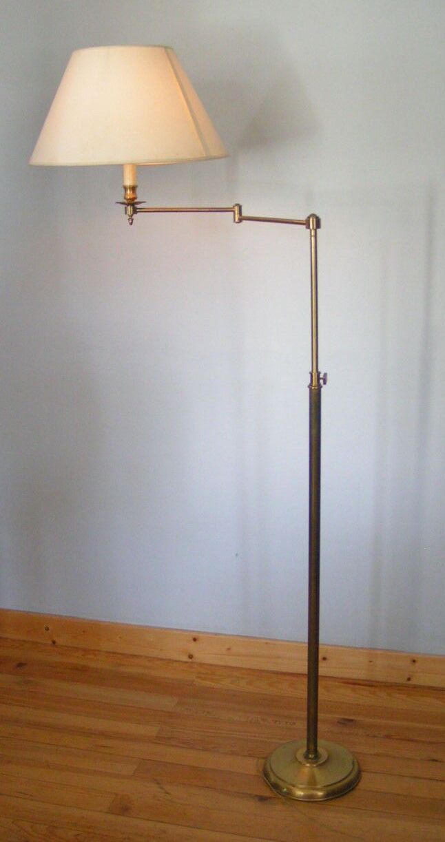 Articulated brass floor lamp