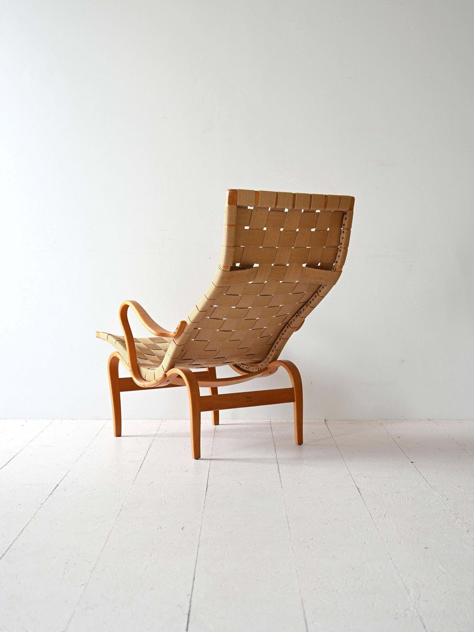 “Pernilla” armchair and footstool designed by Bruno Mathsson