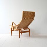 “Pernilla” armchair and footstool designed by Bruno Mathsson