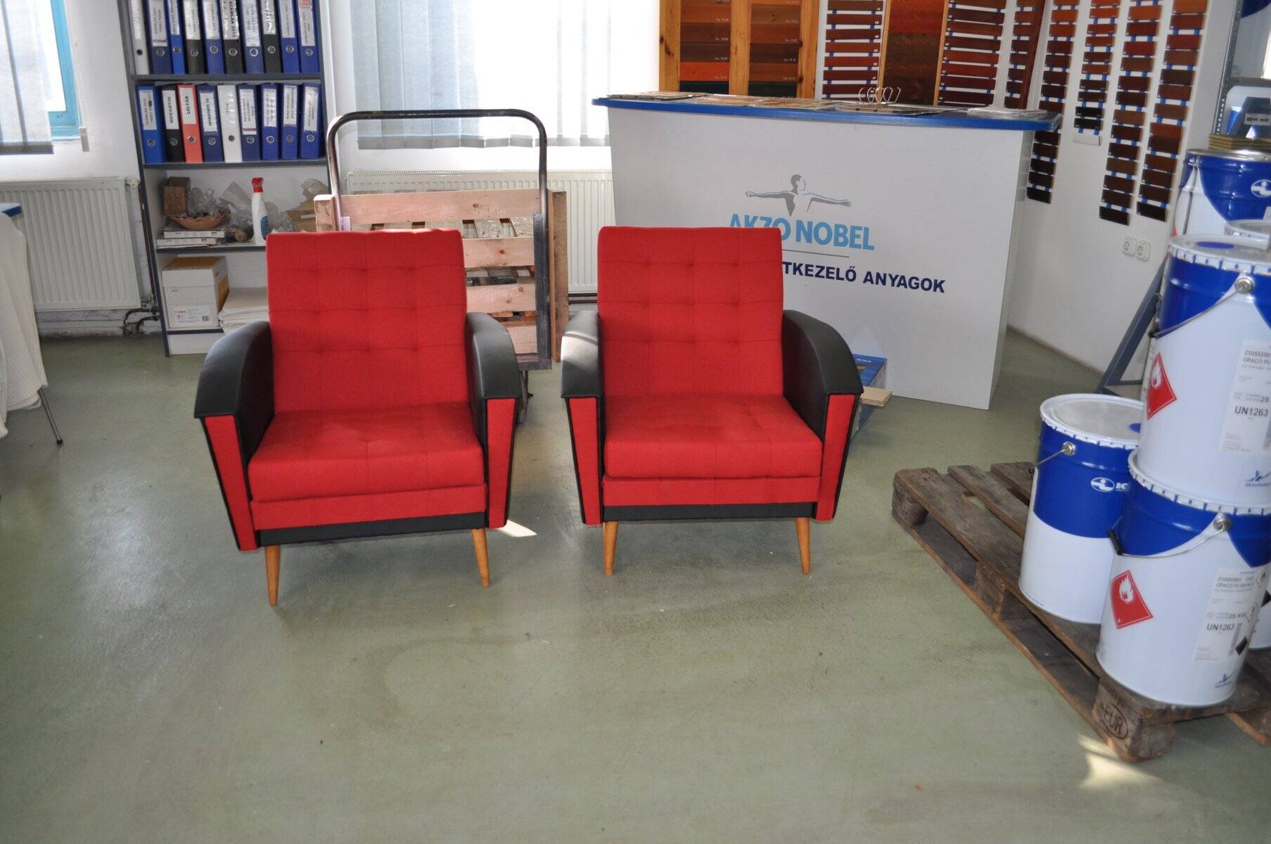 Pair of vintage red fabric armchairs with light wood legs from the 1960s.