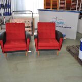 Pair of vintage red fabric armchairs with light wood legs from the 1960s.