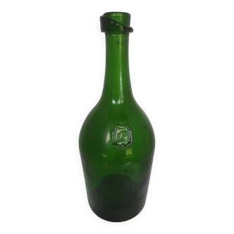 Old thick green glass bottle