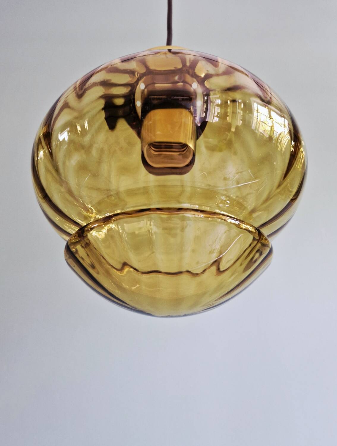 Set of 3 amber glass pendant lights, RAAK Amsterdam, 1970