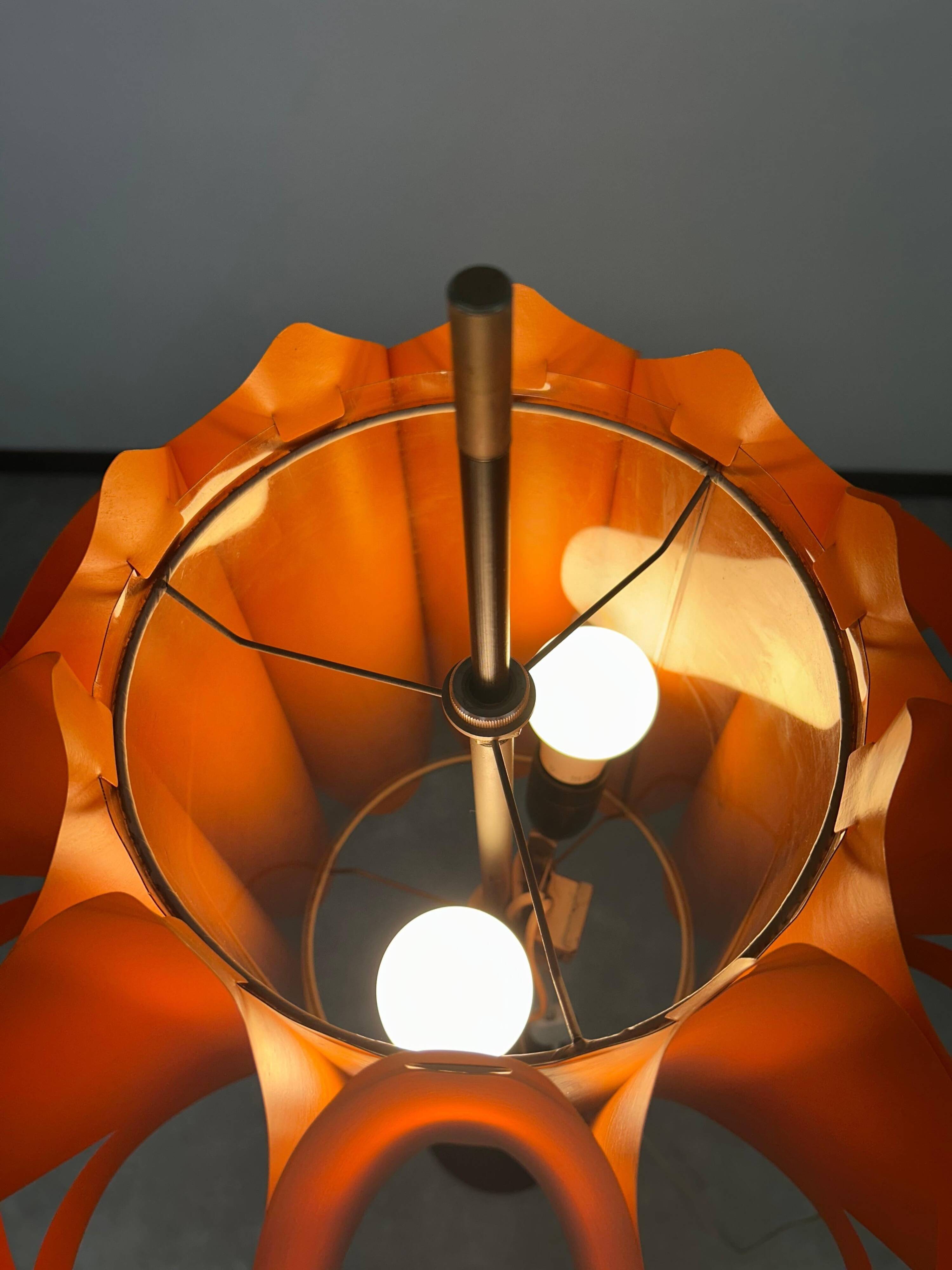 Orange floor lamp by Milanda Havlova - Vest Leuchten