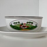 Naïve Design oval sauce boat on its Villeroy & Boch glass-porcelain display
