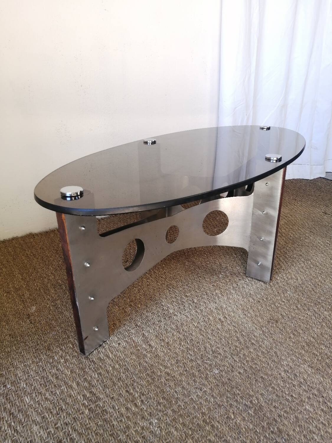 Vintage design coffee table in brushed aluminum and glass top.