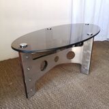 Vintage design coffee table in brushed aluminum and glass top.