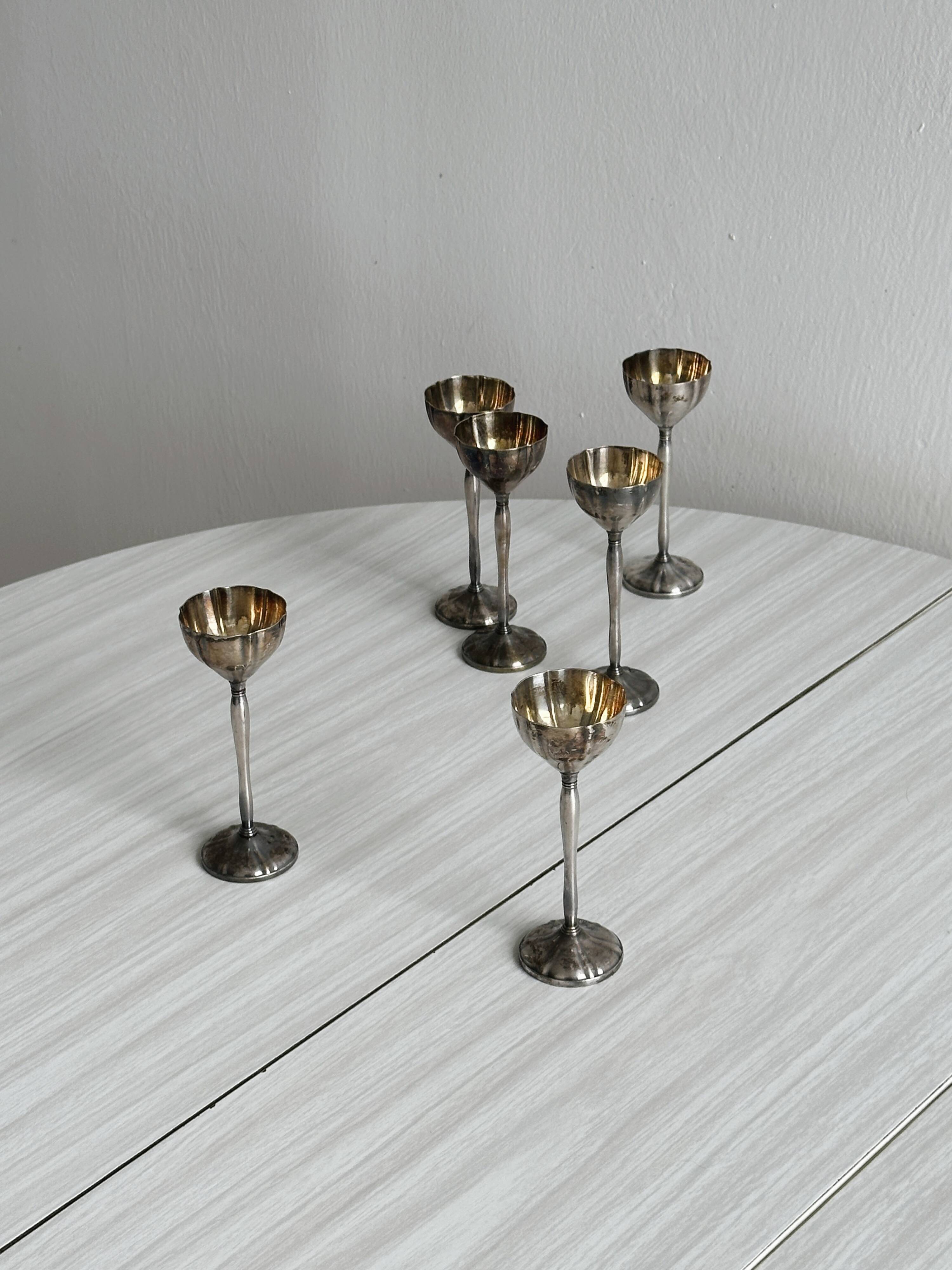 Set of 6 antique egg cups in patinated metal