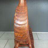 Decorative rocking elephant in carved exotic wood.