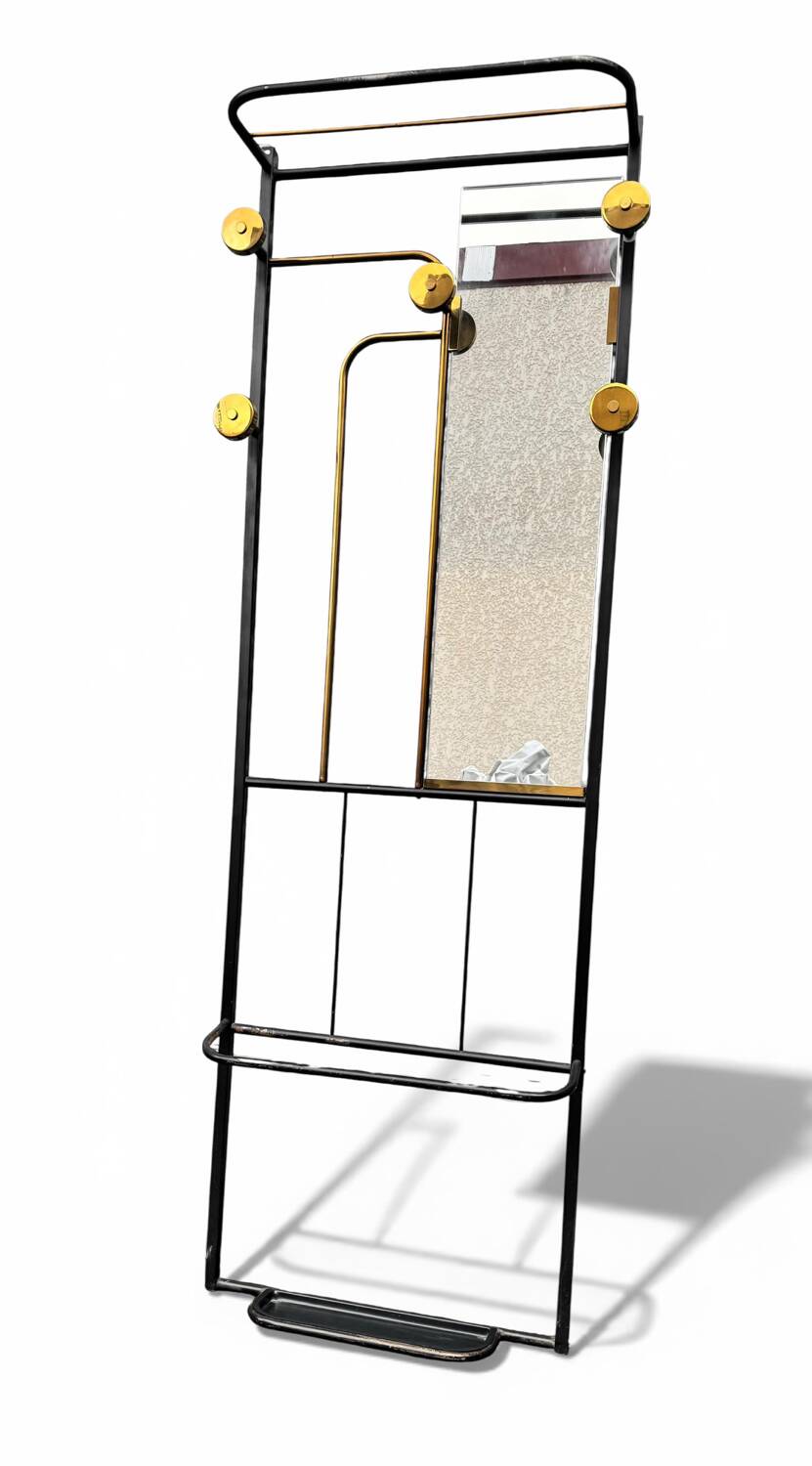1960s modernist wardrobe. Gold lacquered metal.