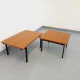 Suite of two vintage modernist Isa coffee tables in teak and black metal from the 60s