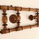 Vintage wooden wall coat rack with 4 swivel hooks from 1920