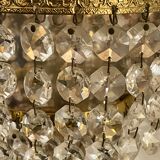 Pair of brass sconces and tassels