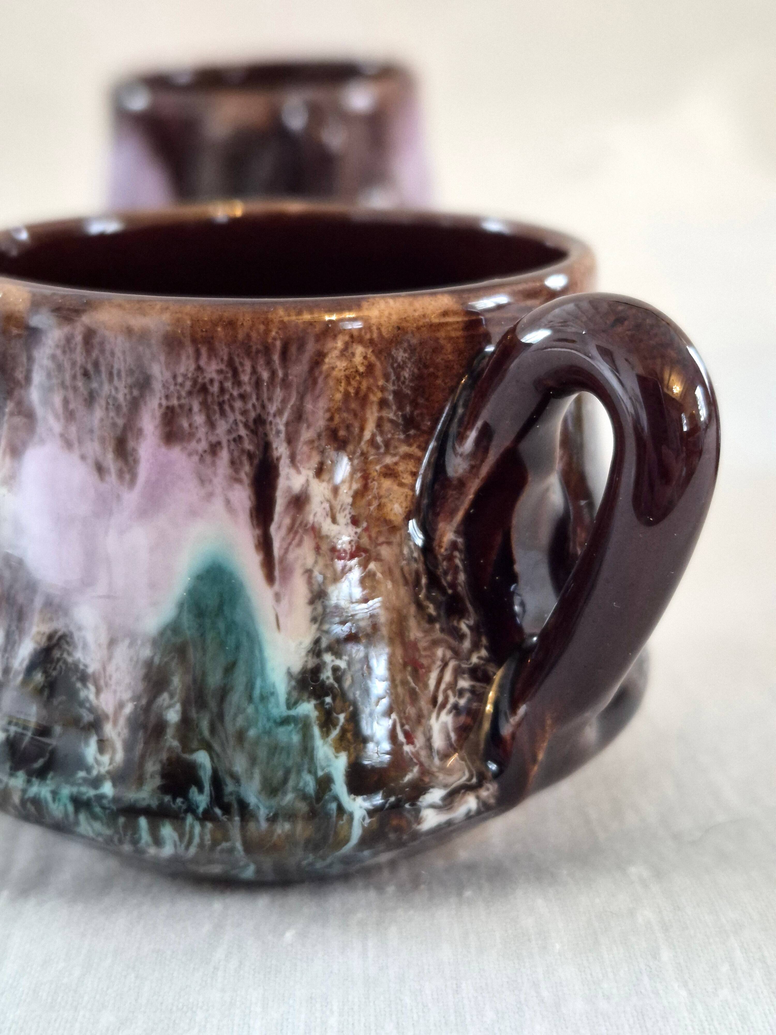 Six cups and saucers Vallauris glazed ceramic in brown and old pink.