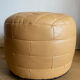 Beige patchwork leather pouf from Sède