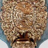 Patinated bronze holy water font