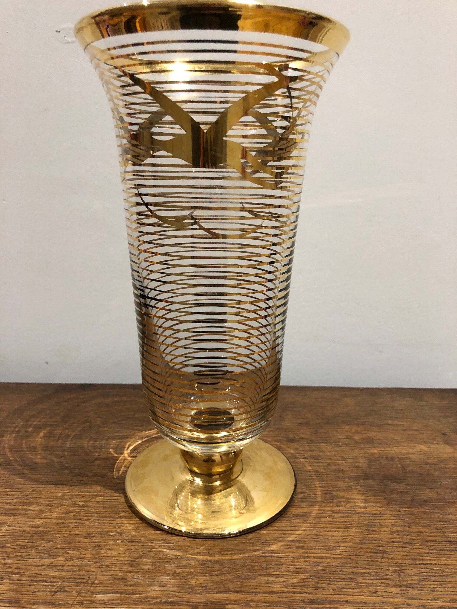 Glass vase with gold bird decoration