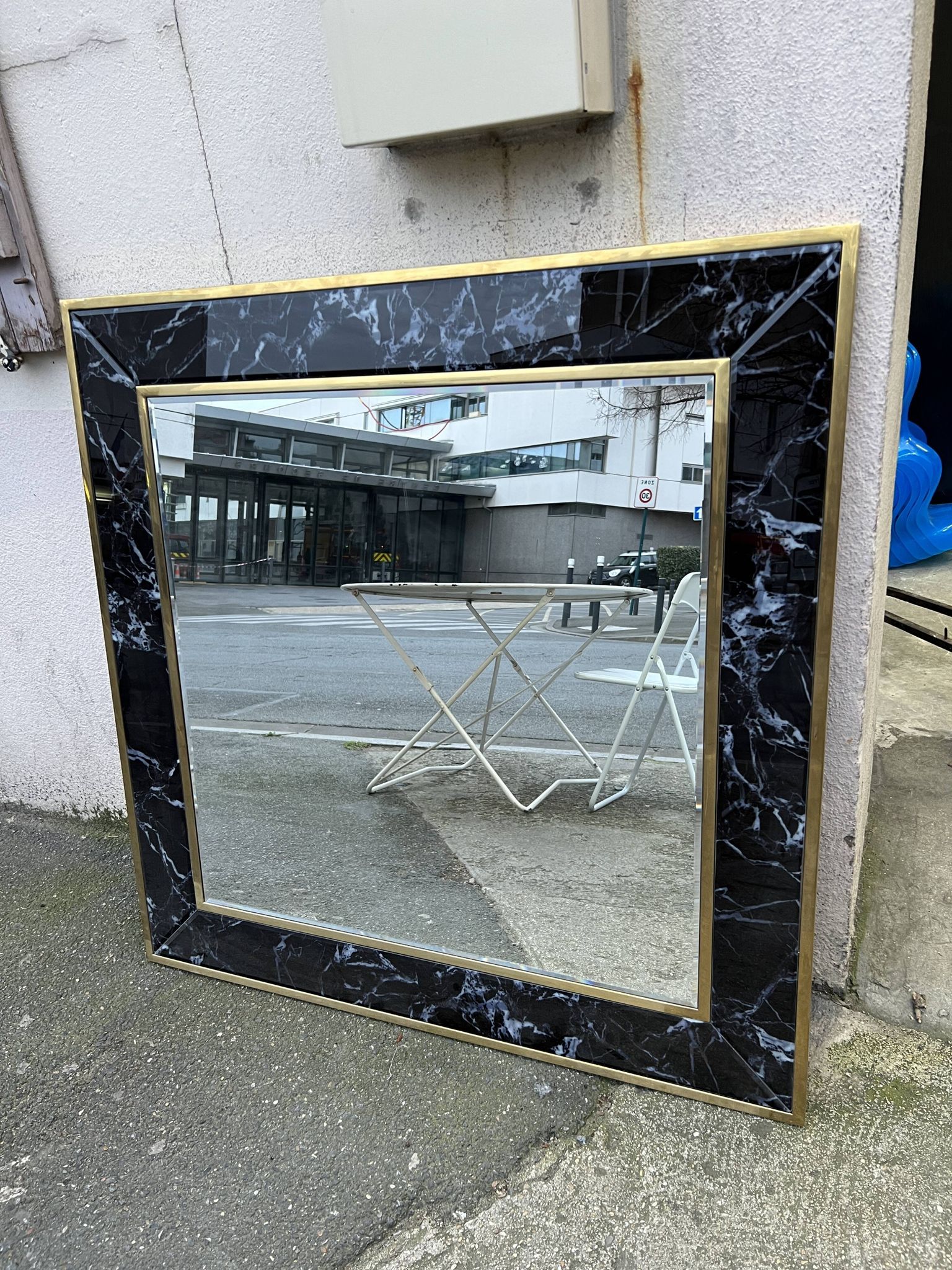 Mirror in brass and white veined black marble from the 70s